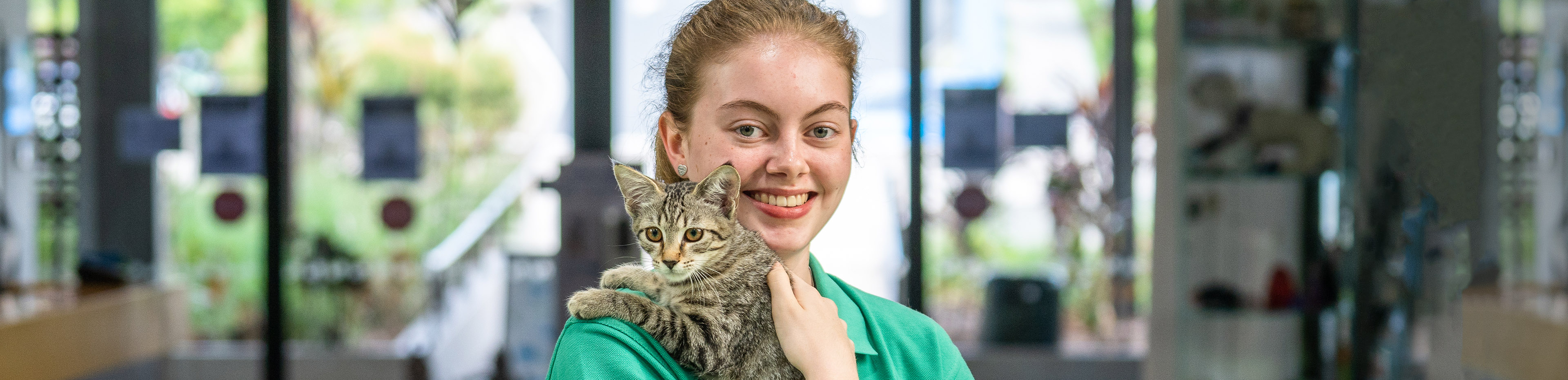 junior crew member olivia with cat